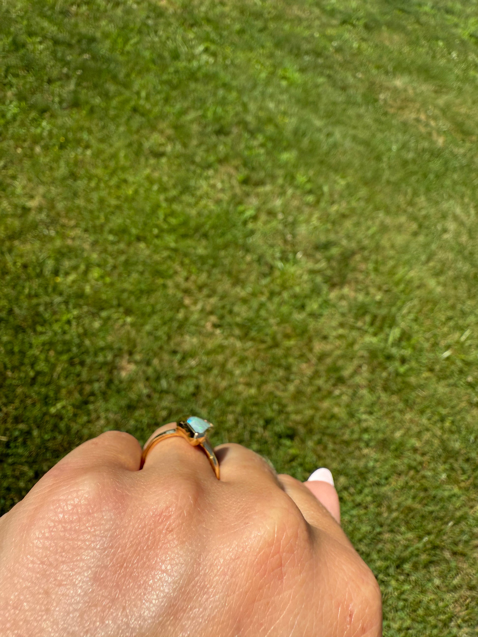 Opal Solitaire Ring in Yellow Gold